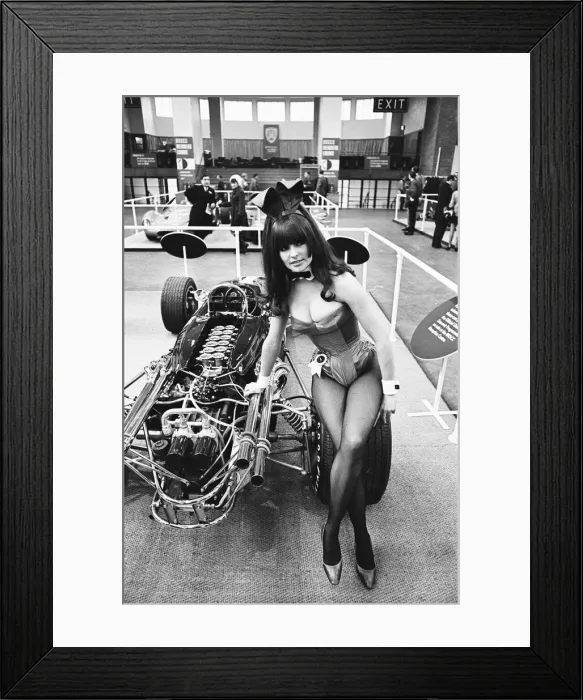 Framed Print : Model drapped over a hot rod dragster car at Motor Show at Horticultural Hall 2nd January