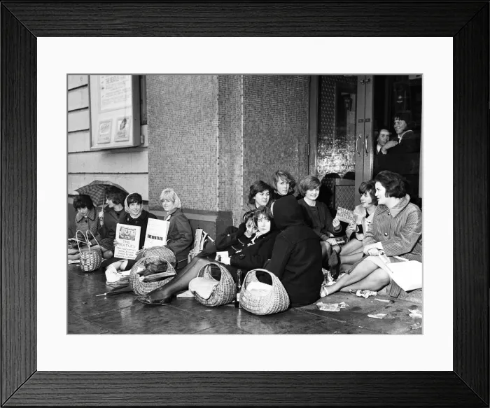 Framed Print : Teenagers queuing in the rain at The Majestic Ballroom, Birkenhead for tickets to see