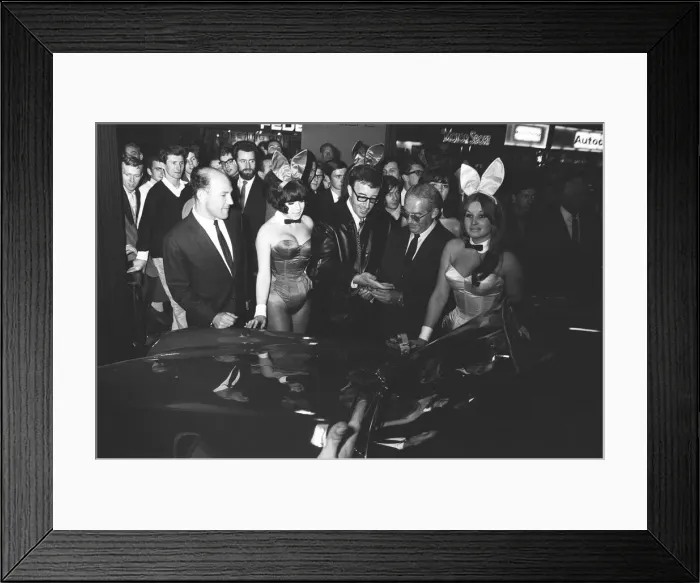 Framed Print : Bunny girls and Peter Seller seen here at the British International Motor Show in London Framed Print : Bunny girls and Peter Seller seen here at the British International Motor Show in London
