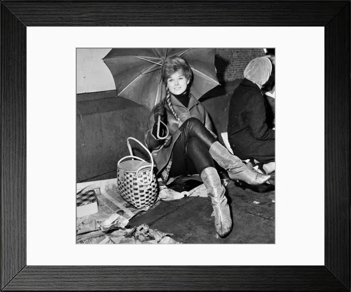Framed Print : Teenagers queuing in the rain at The Majestic Ballroom, Birkenhead for tickets to see