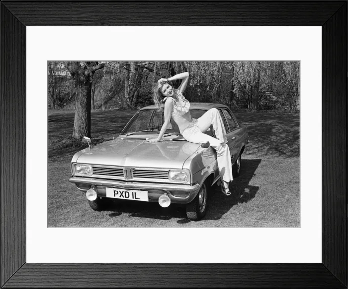 Framed Print : Reveille model Lia seen here posing with a Vauxhall Viva car which is a top prize in