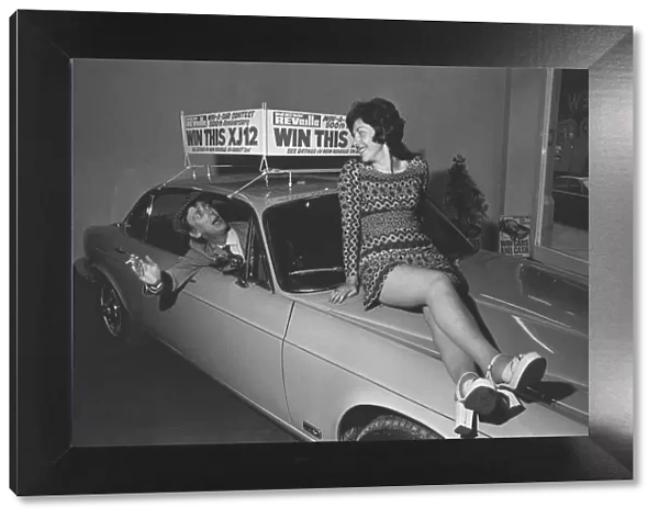 Comedian Colin Crompton seen here posing with a Jaguar XJ12