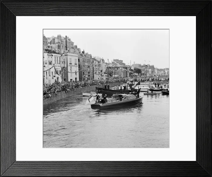 Framed Print : Crowds await the arrival of Her Majesty Queen Elizabeth II at St Peter Port in Guernsey Framed Print : Crowds await the arrival of Her Majesty Queen Elizabeth II at St Peter Port in Guernsey