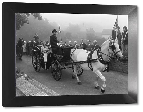 Queen Elizabeth June 1978 and the Duke sitting in a horse-drawn carriage during a vist