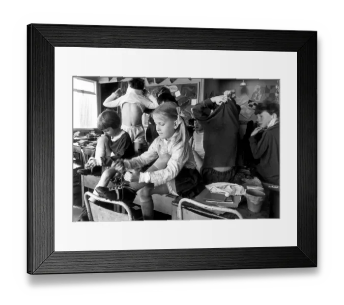 Framed Print : Yvonne Davis preparing herself in the changing room before playing in her school Rugby Framed Print : Yvonne Davis preparing herself in the changing room before playing in her school Rugby