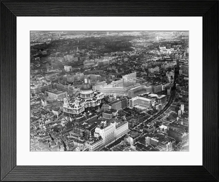 Framed Print : An aerial view of London showing St Pauls Cathedral flanked by some of the new office Framed Print : An aerial view of London showing St Pauls Cathedral flanked by some of the new office