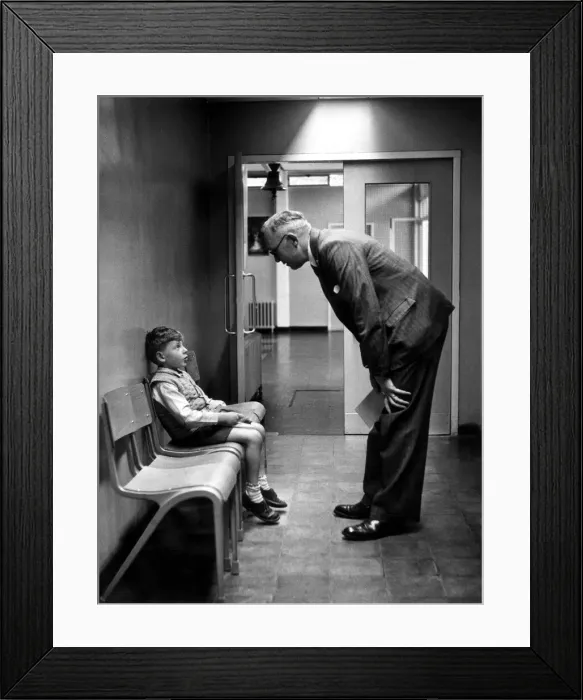 Framed Print : Seven year old Richard Colman meets the headmaster Mr Hart at South Mead Primary school Framed Print : Seven year old Richard Colman meets the headmaster Mr Hart at South Mead Primary school