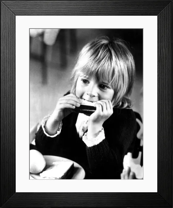 Framed Print : Young girl eating her lunch at school. 30th September 1971 Framed Print : Young girl eating her lunch at school. 30th September 1971