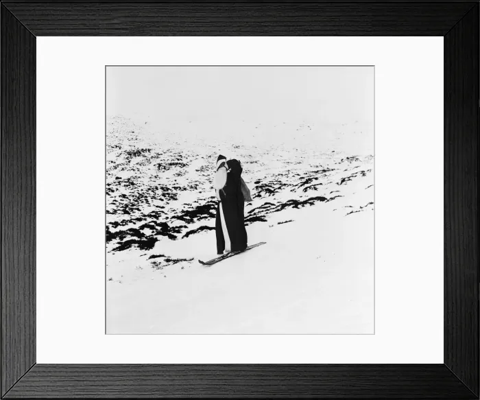 Framed Print : Father Christmas on a pair of skis on the mountain slopes. 31st December 1957