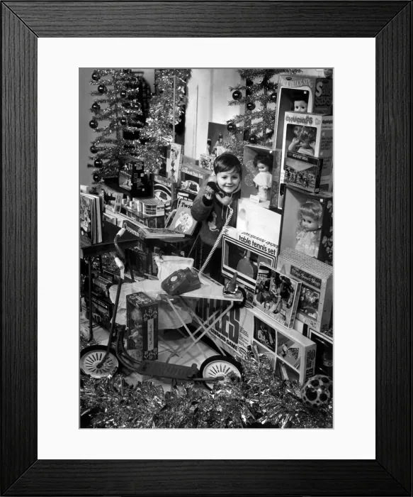 Framed Print : Young boy surrounded by toys. 23rd November 1970 Framed Print : Young boy surrounded by toys. 23rd November 1970