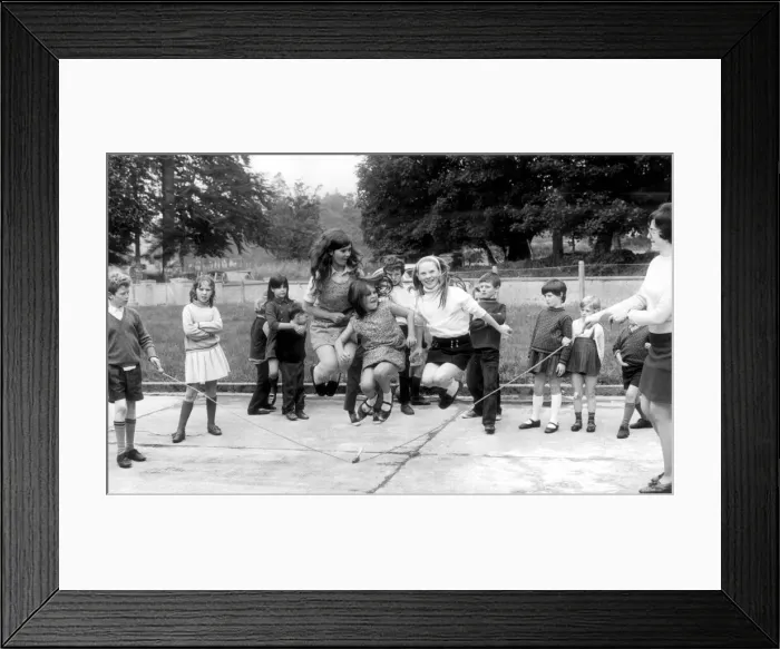 Framed Print : Schoolchildren skipping in the playground. 10th October 1971