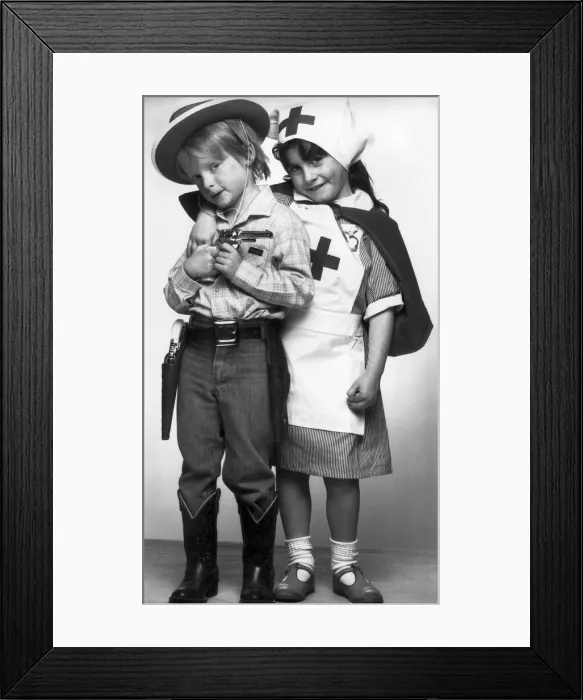 Framed Print : Childre dressed up as cowboy and nurses. 16th April 1985 Framed Print : Childre dressed up as cowboy and nurses. 16th April 1985