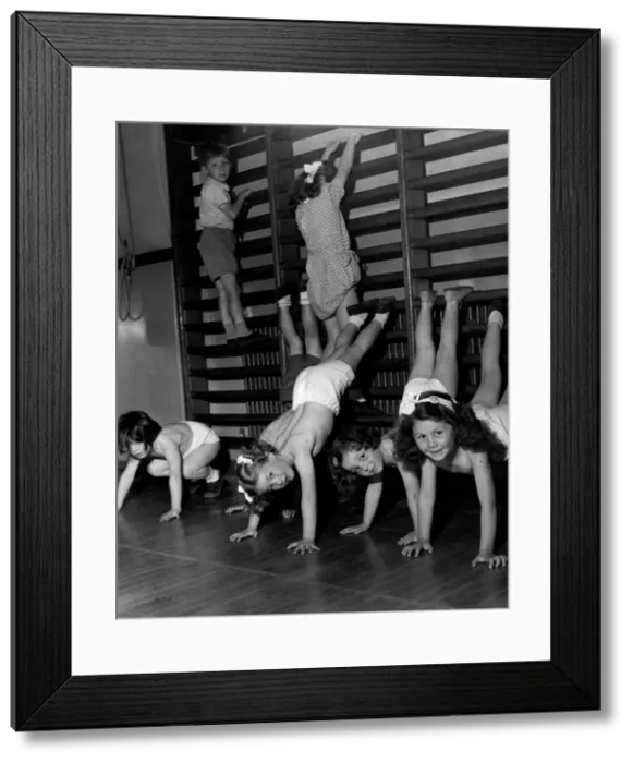 Framed Print : Physical Education at White Hart Lane Infant School. 22nd June 1950 Framed Print : Physical Education at White Hart Lane Infant School. 22nd June 1950