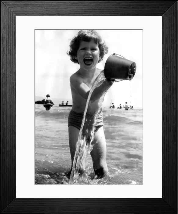 Framed Print : Three yar old Sandra Finnerty of Perivale, Middlesex enjoys her first splash ever Framed Print : Three yar old Sandra Finnerty of Perivale, Middlesex enjoys her first splash ever