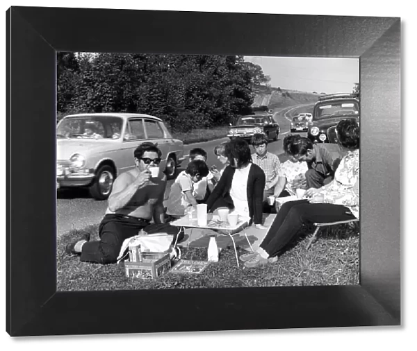 The Williams family picnicing on the main Newton Abbot to Plymouth Road