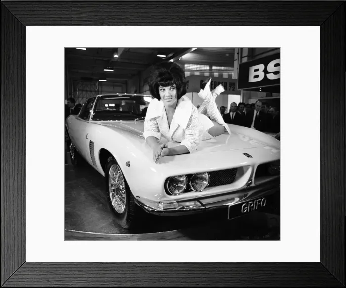 Framed Print : Models drapped over the latest Iso Grifo car at the 1966 London Motor Show 18th October Framed Print : Models drapped over the latest Iso Grifo car at the 1966 London Motor Show 18th October