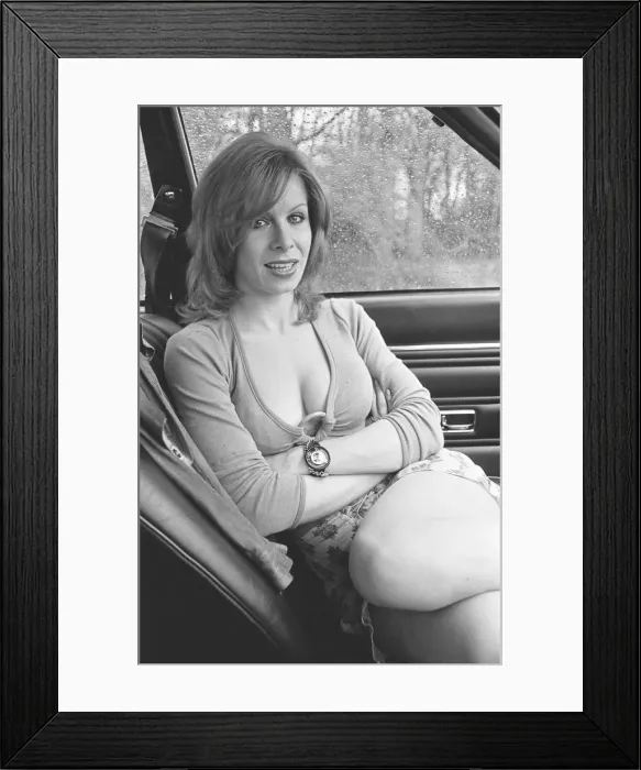 Framed Print : Reveille model Malou Cartwright seen here posing with a Volkswagen Beetle in the guise of Framed Print : Reveille model Malou Cartwright seen here posing with a Volkswagen Beetle in the guise of