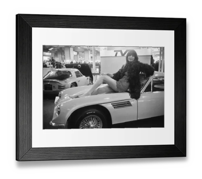Framed Print : Model poses on the bonnet of a TVR at the Motor Show 15th October 1968
