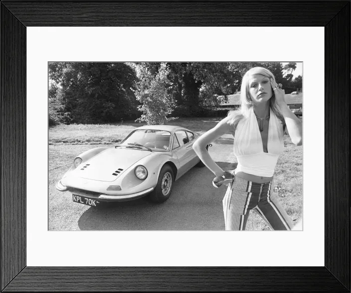 Framed Print : Reveille model Heidi seen here posing with a Ferrari Dino GT which is NOT A top prize in Framed Print : Reveille model Heidi seen here posing with a Ferrari Dino GT which is NOT A top prize in