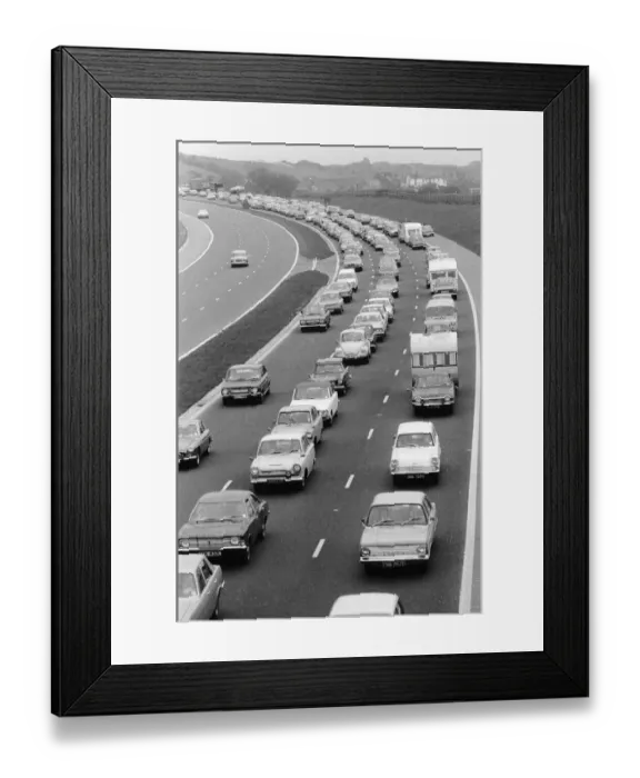 Framed Print : A traffic jam on the M61 motorway as holidaymakers try to make their way to Blackpool