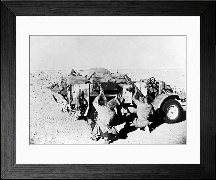 Framed Print : Men of the New Zealand forces take cover behind their truck at El Alamein