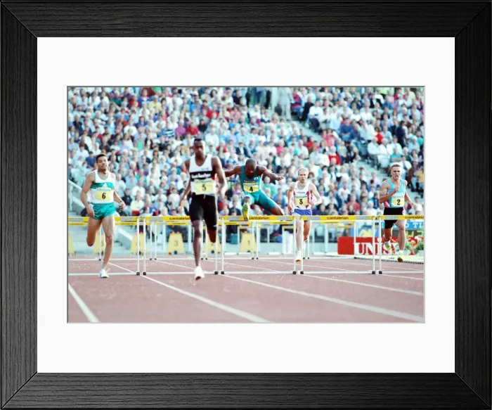 Framed Print : British hurdler Kriss Akabusi in action at a meeting in Britain after the 1992 Olympic Framed Print : British hurdler Kriss Akabusi in action at a meeting in Britain after the 1992 Olympic