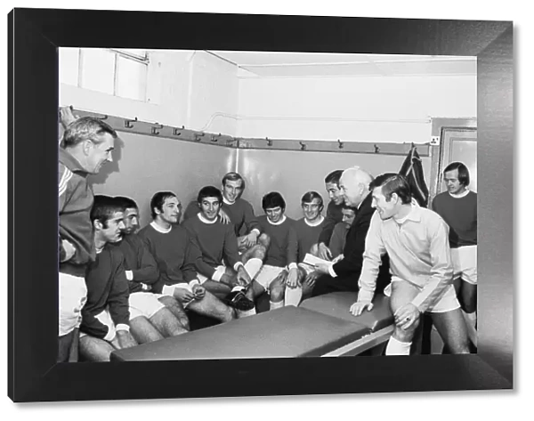 The Bristol Rovers football team have a chat with manager Bill Dodgin in their team