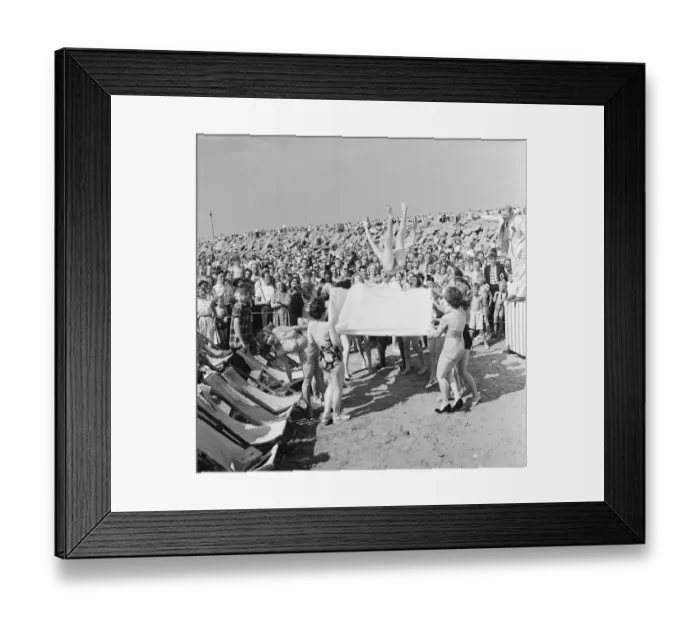 Framed Print : Sunday Pictorial 1957 Beach Party. Angela Manselle seen here being giving the bumps