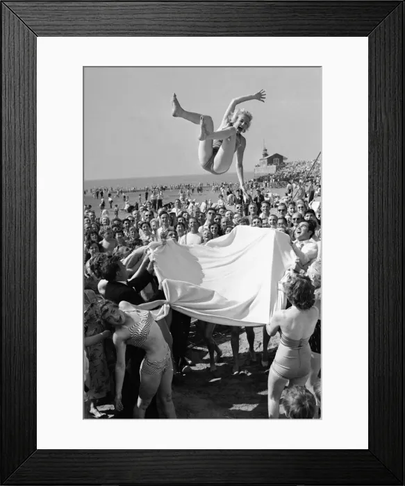 Framed Print : Sunday Pictorial 1957 Beach Party. Angela Manselle seen here being giving the bumps Framed Print : Sunday Pictorial 1957 Beach Party. Angela Manselle seen here being giving the bumps