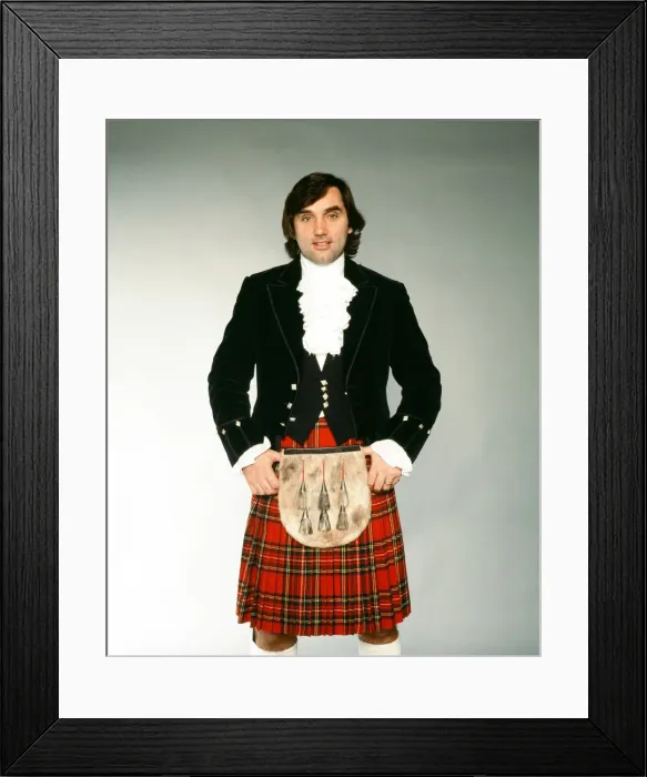 Framed Print : George Best wearing a kilt after signing for Hibernian. 24th November 1979 Framed Print : George Best wearing a kilt after signing for Hibernian. 24th November 1979