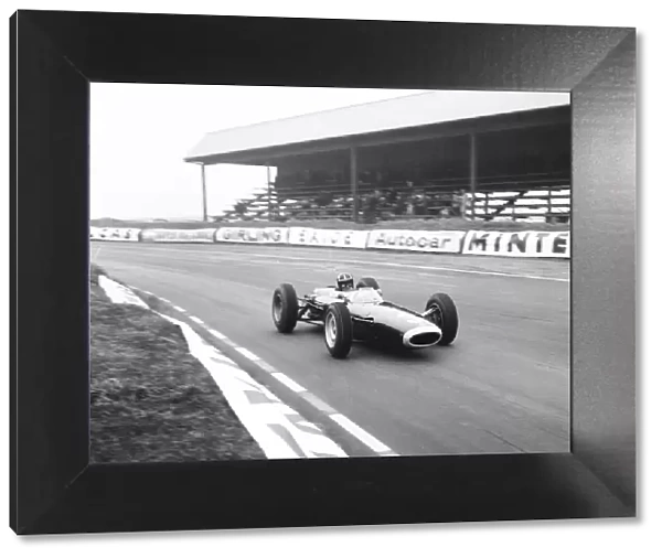 Graham Hill seen here during practise in his BRM at Snetterton 13th March 1964 *** Local