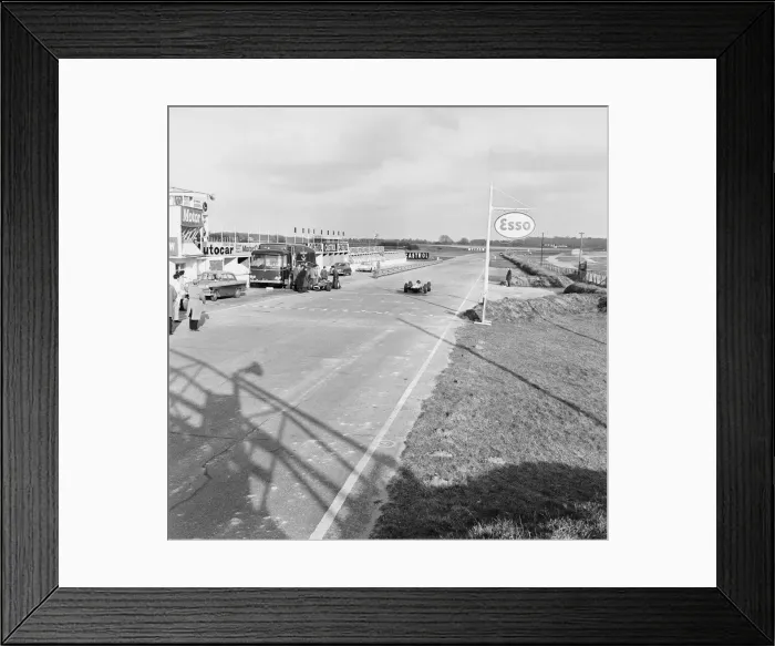 Framed Print : Jim Clark speeds down the pit straight during trials in is new Lotus 33 at Snetterton Framed Print : Jim Clark speeds down the pit straight during trials in is new Lotus 33 at Snetterton