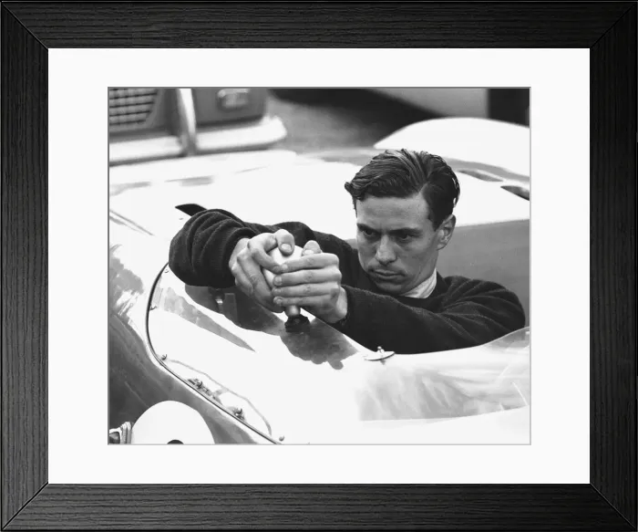 Framed Print : Jim Clark adjusts the mirror on his Lotus 23 before the start of the Autosport 3 hour