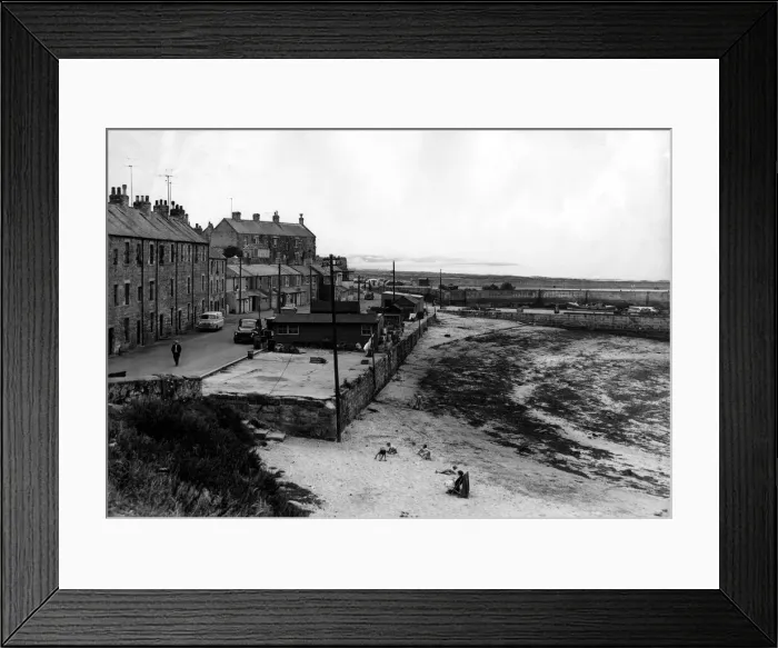 Framed Print : Far from the crowded beaches, this peaceful scene at the coastal village of Seahouses