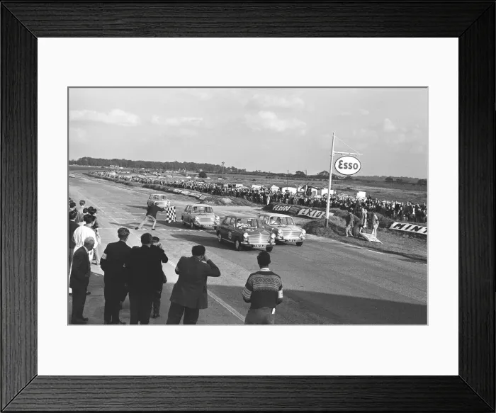Framed Print : Competitors take the checkered flag in the Molyslip Morris 1100 race at Snetterton race Framed Print : Competitors take the checkered flag in the Molyslip Morris 1100 race at Snetterton race