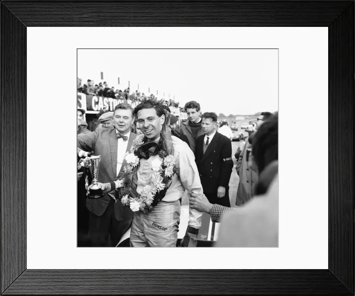 Framed Print : Jim Clark celebrates winning the Martini Rossi Trophy race at Snetterton 29th September Framed Print : Jim Clark celebrates winning the Martini Rossi Trophy race at Snetterton 29th September