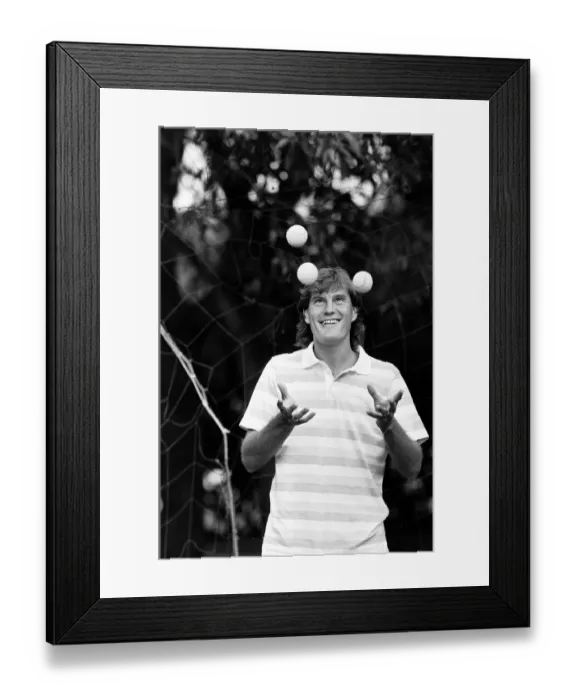 Framed Print : England footballer Glenn Hoddle juggling tennis balls as the team relaxes at their base Framed Print : England footballer Glenn Hoddle juggling tennis balls as the team relaxes at their base