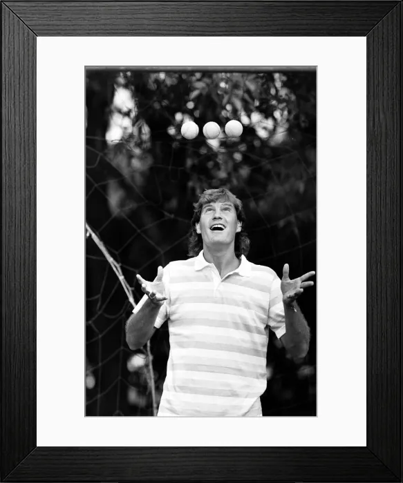 Framed Print : England footballer Glenn Hoddle juggling tennis balls as the team relaxes at their base Framed Print : England footballer Glenn Hoddle juggling tennis balls as the team relaxes at their base
