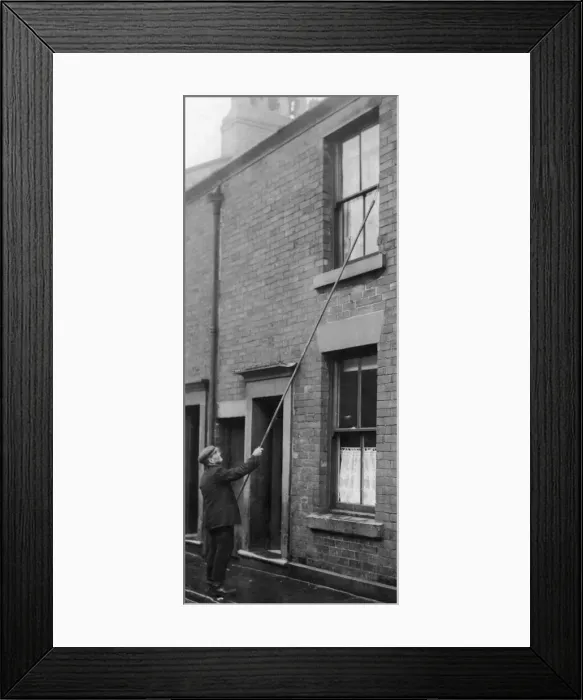 Framed Print : J Thompson the oldest knocker up in Blackburn. The job of a knocker-up Framed Print : J Thompson the oldest knocker up in Blackburn. The job of a knocker-up