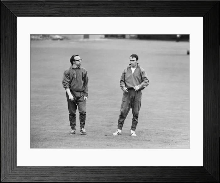 Framed Print : England footballers Nobby Stiles and Jimmy Greaves relax with a game of cricket the day Framed Print : England footballers Nobby Stiles and Jimmy Greaves relax with a game of cricket the day
