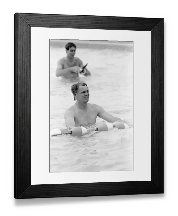 Framed Print : England manager Bobby Robson relaxing in the swimming pool at the Cima Club in Monterrey Framed Print : England manager Bobby Robson relaxing in the swimming pool at the Cima Club in Monterrey