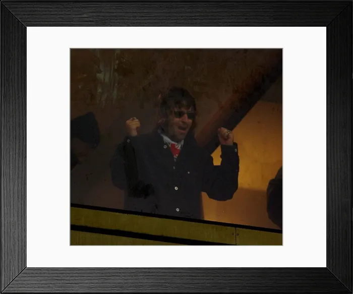 Framed Print : Liam Gallagher of Oasis celebrates the win May 1999 of his team Gillingham v