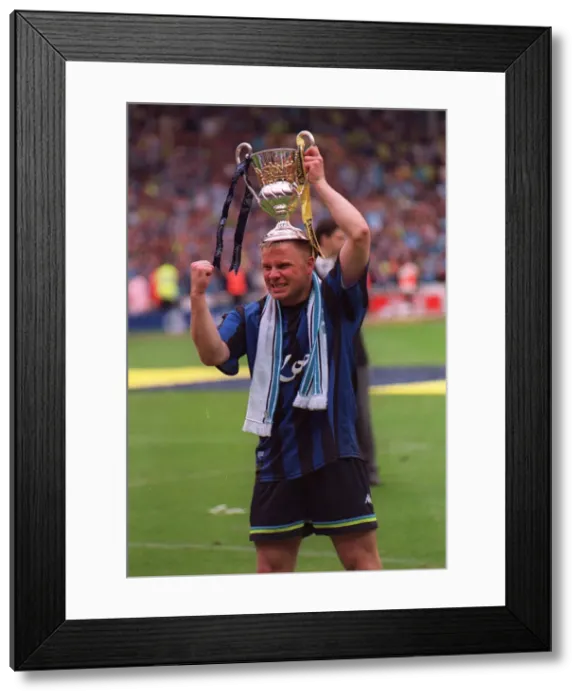 Framed Print : Manchester City captain Andy Morrison May 1999 celebrates with trophy