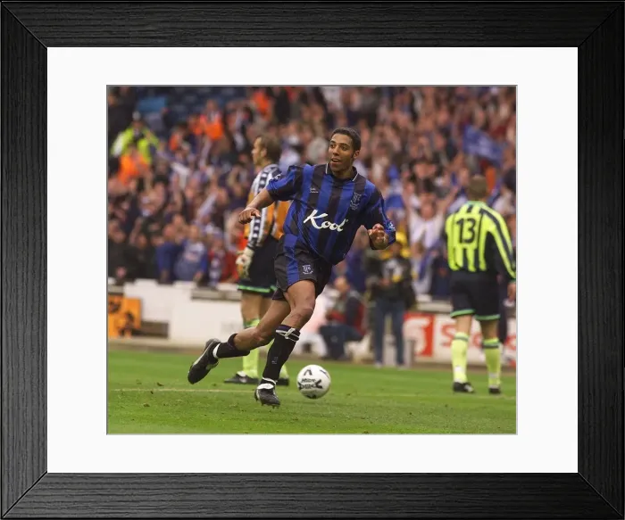 Framed Print : Carl Asaba celebrates Gillinghams 1st goal May 1999 against Manchester