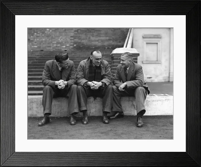 Framed Print : Leicester City footballer Don Revie (left) poses with club directors during a training Framed Print : Leicester City footballer Don Revie (left) poses with club directors during a training