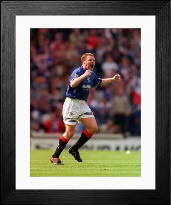 Framed Print : Glasgow Rangers footballer Paul Gascoigne celebrates after scoring one of his three goals