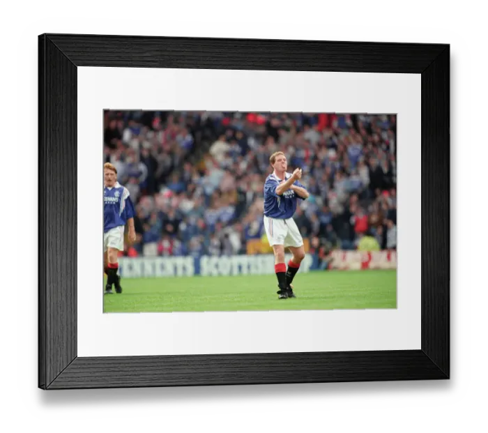 Framed Print : Glasgow Rangers footballer Paul Gascoigne making a one finger gesture while sticking out