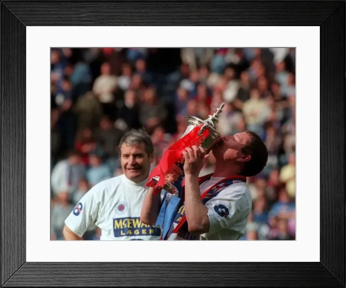 Framed Print : Glasgow Rangers footballer Paul Gascoigne kisses the trophy as he celebrates Rangers win Framed Print : Glasgow Rangers footballer Paul Gascoigne kisses the trophy as he celebrates Rangers win