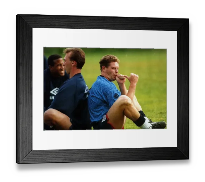 Framed Print : England footballer Paul Gascoigne joking and sucking his thumb as he sits back to back
