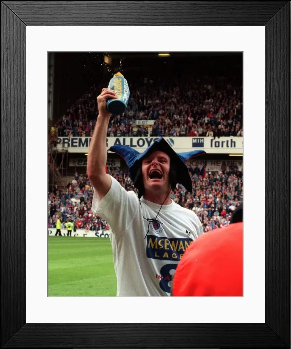 Framed Print : Glasgow Rangers footballer Paul Gascoigne wearing jester hat as he celebrates Rangers win Framed Print : Glasgow Rangers footballer Paul Gascoigne wearing jester hat as he celebrates Rangers win